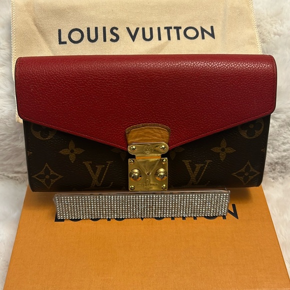 Louis Vuitton Handbags - Louis Vuitton Pallas long monogrammed and red leather bifold wallet